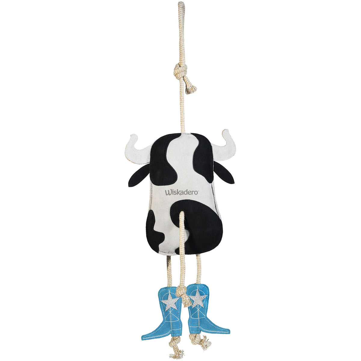 Full back view of the Wiskadero Cow Pie equine boredom buster toy. Highlights the stamped Wiskadero logo on the black and white suede cow head, white suede horns, turquoise cowboy boots with white embroidered stars, pull-through natural rope tail, and top hanging loop.