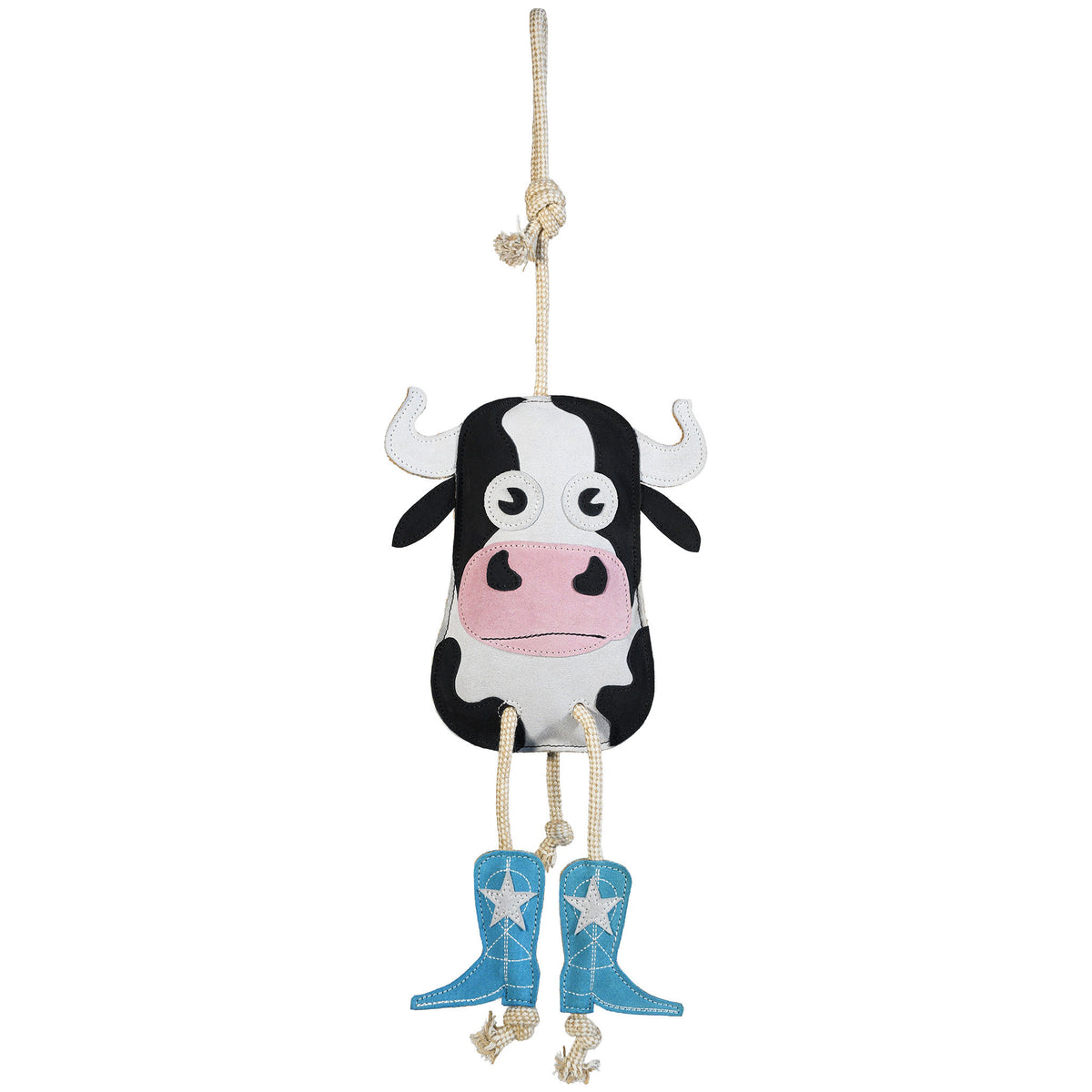 Full front view of the Wiskadero Cow Pie equine boredom buster toy. Highlights the black and white suede cow head with a pink snout, turquoise cowboy boots with white embroidered stars, pull-through natural rope tail, and top hanging loop.