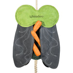 Enlarged back view of the Wiskadero Shoofly equine boredom buster toy. Demonstrates the interactive treat-hiding pocket located behind the dark gray suede wings, stuffed with fresh carrots.