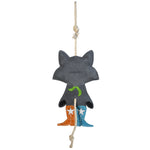 Full back view of the Wiskadero Trash Panda equine boredom buster toy. Highlights the stamped Wiskadero logo on the gray suede raccoon body, lime green bandana tie, natural rope tail, mismatched orange and turquoise suede cowboy boots with embroidered white stars, and top hanging loop.
