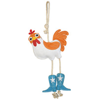 Full front view of the Wiskadero What the Cluck equine boredom buster toy. Highlights the white and orange suede chicken body with red comb and wattle, turquoise cowboy boots with embroidered white stars, and natural rope pull-through legs and top hanging loop.